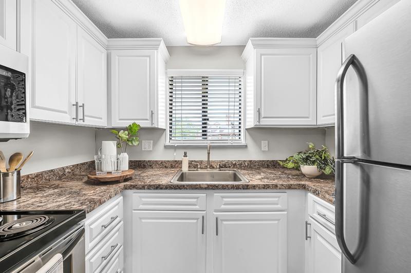 Modern Style Kitchens | You'll enjoy our newly updated kitchens featuring a built-in pantry area and a dishwasher.