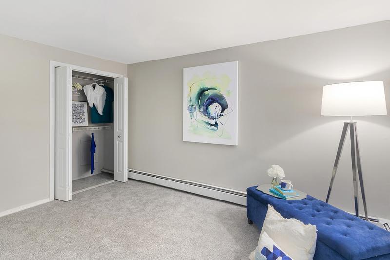 Spacious Bedroom | Spacious bedrooms featuring plush carpeting and closets with organizers.