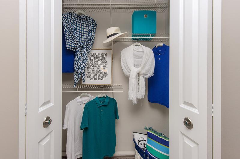 Closets with Built-In Organizers | Closets feature built-in organizers, allowing you store all your belongings. 