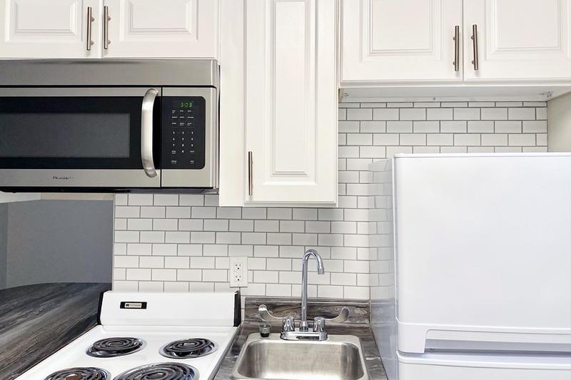 White Subway Tile Backsplash | Select apartments feature a white subway tile backsplash in the kitchen.