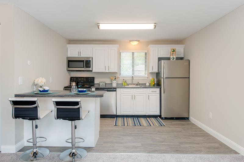 1 Bedroom Kitchen | Spacious open floor plans featuring a neutral & modern color scheme throughout. 