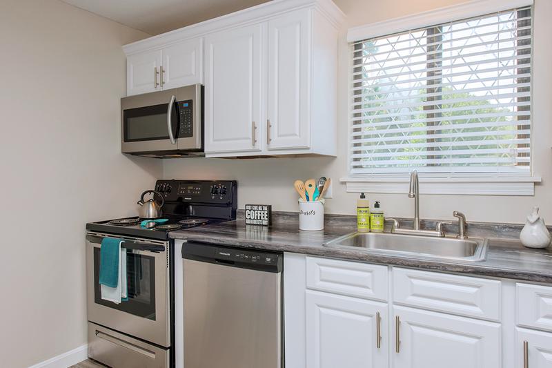 Modern Style Kitchens | Large, open kitchens with stainless steel appliances in select apartments.