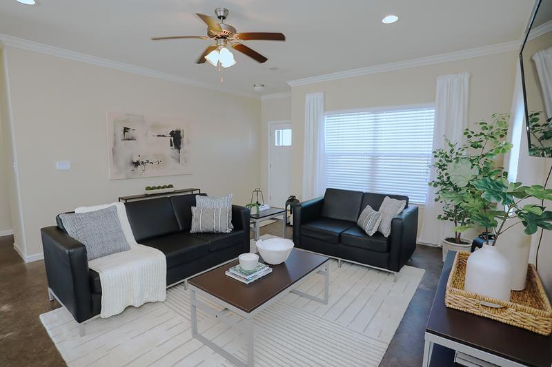 Living Room | Relax in your oversized living room featuring a ceiling fan.