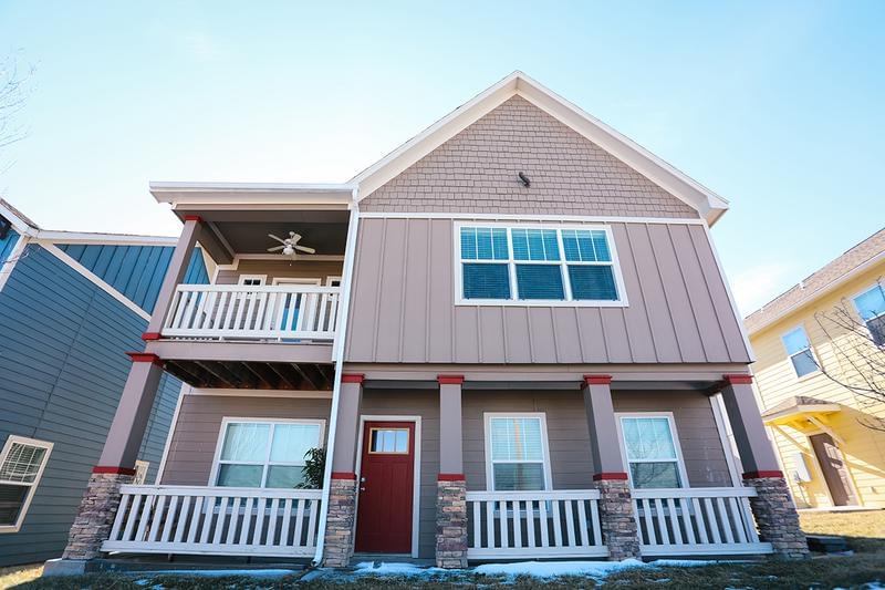 Townhome Exterior | You'll be welcomed home with your own private entries and private patio/balconies.
