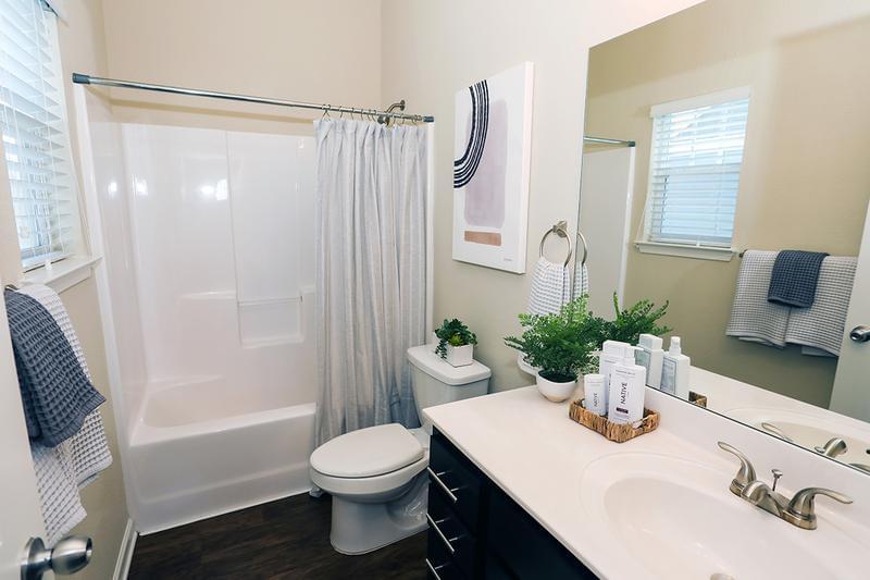 Guest Bathroom | Bathrooms featuring large mirrors.