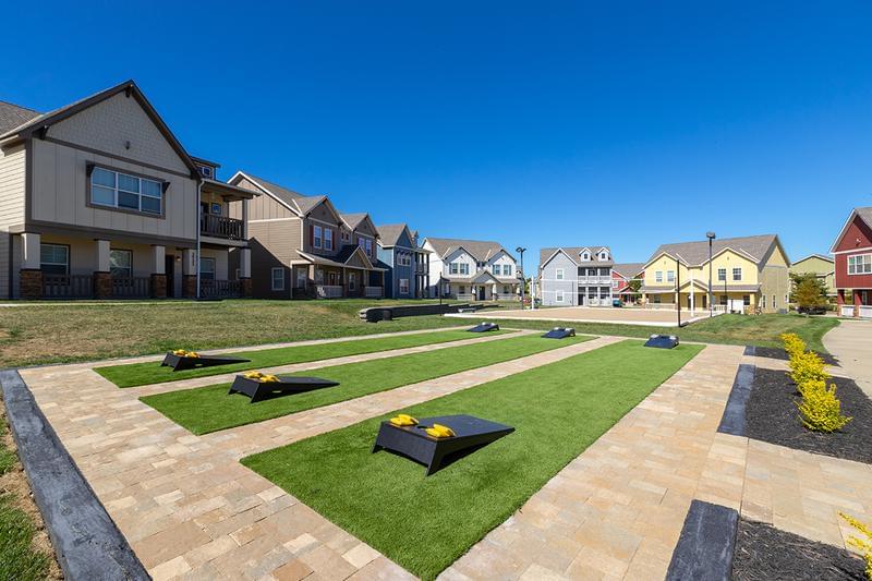 Yard Games | Are you and your friends competitive? Sign up to play a round of cornhole in one of our amenity courtyards.