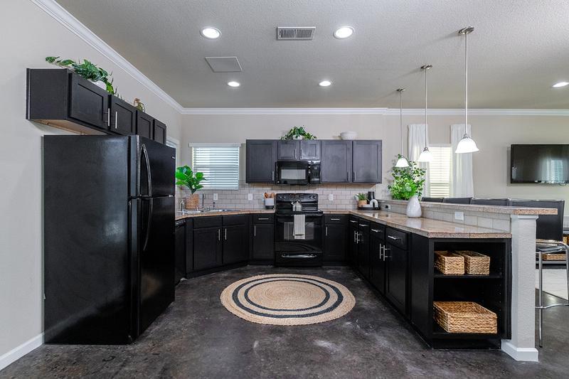 Spacious Kitchen | Kitchens featuring marble countertops, ample cabinetry and an abundance of space for entertaining.