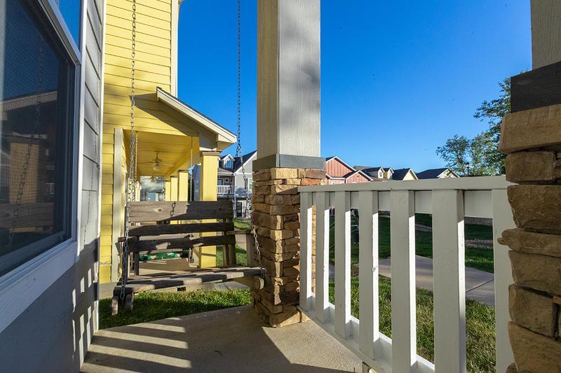 Porch Swing | Need fresh air? Every porch features a wooden swing allowing for time outdoors.