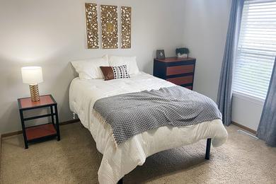 Optional Furnished Bedroom | Each bedroom features a private bathroom, plush carpeting, spacious closets with shelving and the option of having furniture including a bed, 4-drawer dressing, nightstand and desk. 