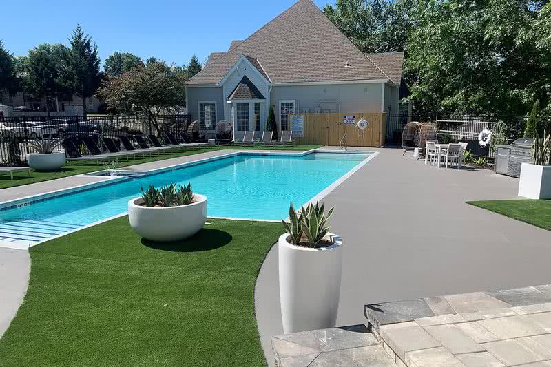 Expansive Sundeck | The pool also features an expansive sundeck with plenty of seating.
