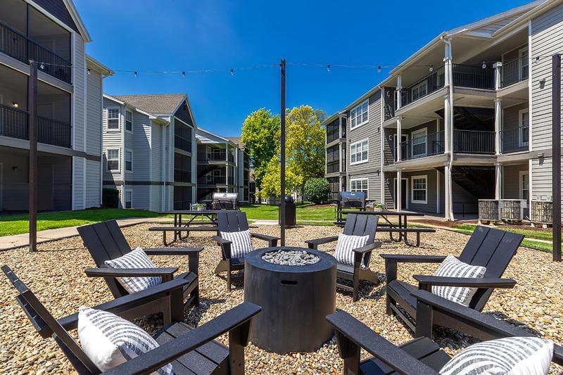 Courtyard Fire Pit | Enjoy the great outdoors from our courtyard featuring a picnic area and fire pit.