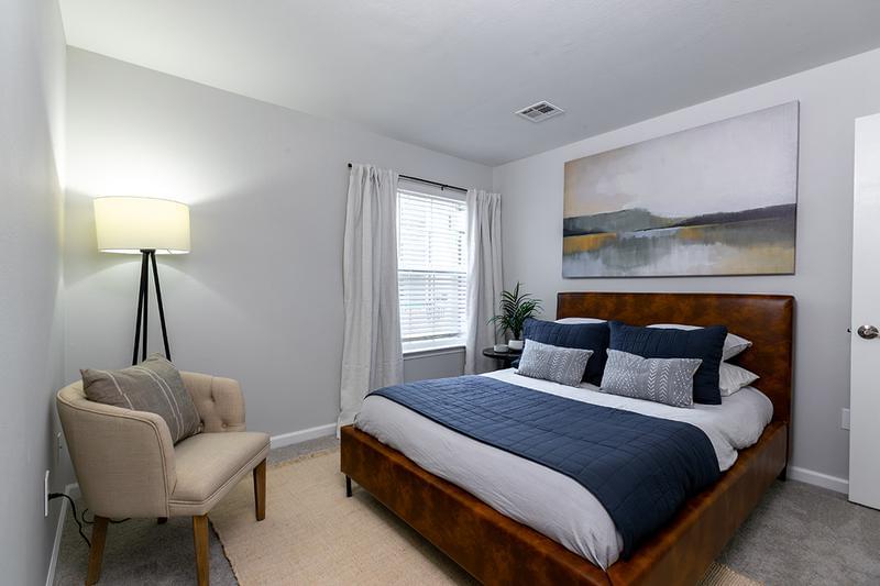 Bedroom | Spacious bedrooms featuring plush carpeting and spacious closets.