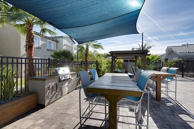 BBQ Lounge Area | Relax and enjoy a meal outside with your family and friends at our BBQ Lounge Area with high top tables and state of the art grills.