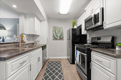 Stainless Steel Appliances | You’ll definitely be the envy of friends and family-alike with this remodeled, chef-style kitchen!