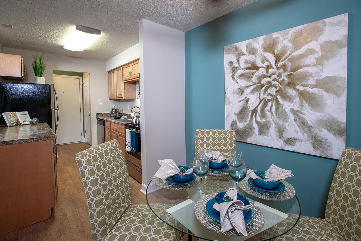 Kitchens open up to a separate dining area.