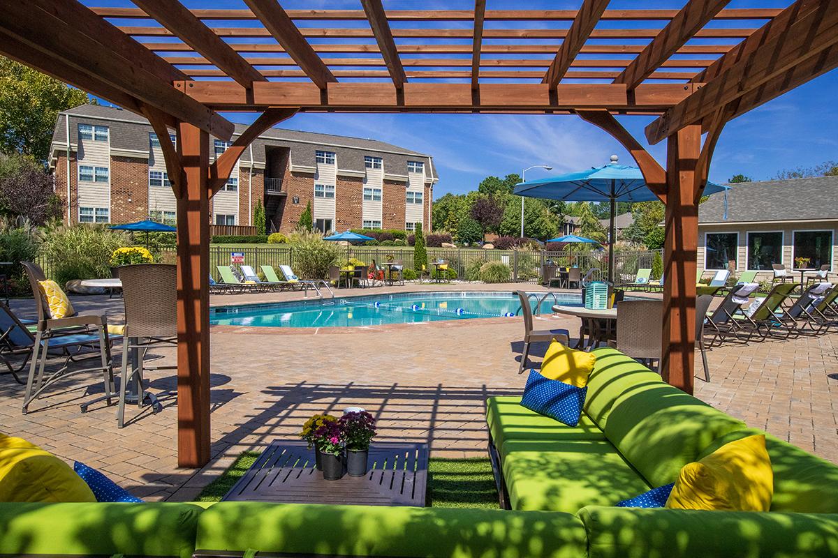 Relax under our poolside pergola.