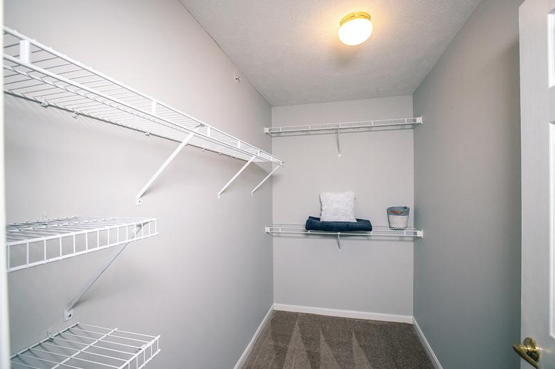 Walk-In Closet | Master bedrooms feature walk-in closets with built-in organizers.