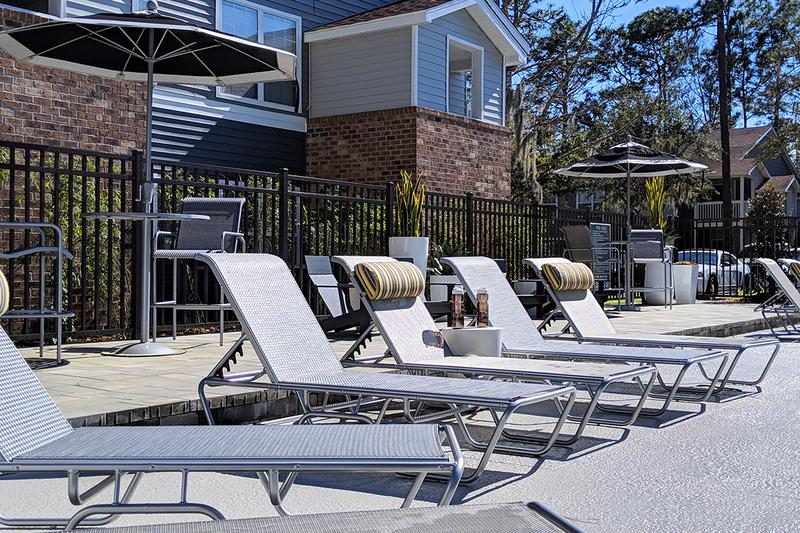 Poolside Loungers | Soak in the sun while laying out in one of our poolside loungers.