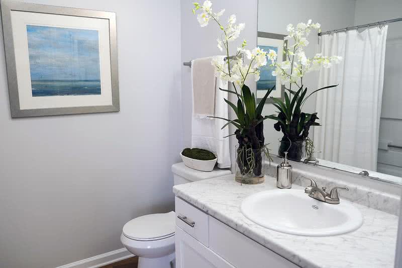 Master Bathroom | Enjoy having your very own private bathroom in the master bedroom with granite-like countertops, white cabinetry and brush nickel hardware.