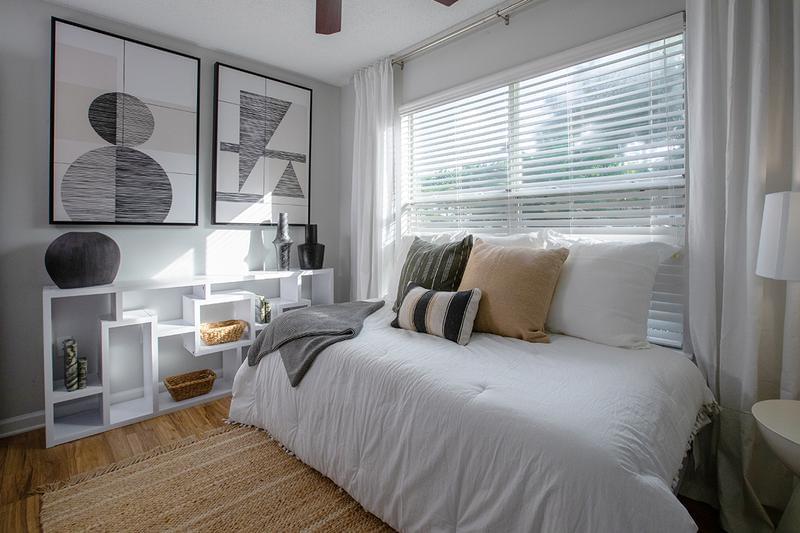 Natural Sunlight | Bedrooms featuring large windows allowing ample natual sunlight to shine through.