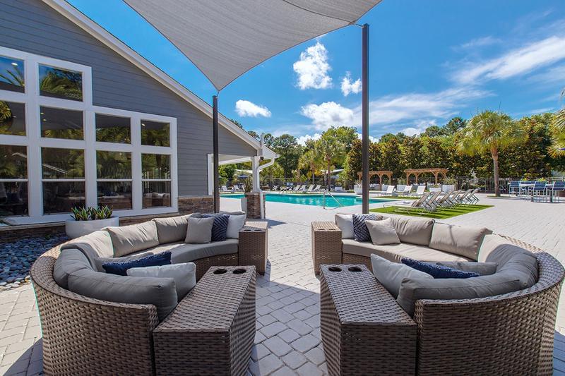 Outdoor Lounge | Have a seat under the shade at our poolside lounge.