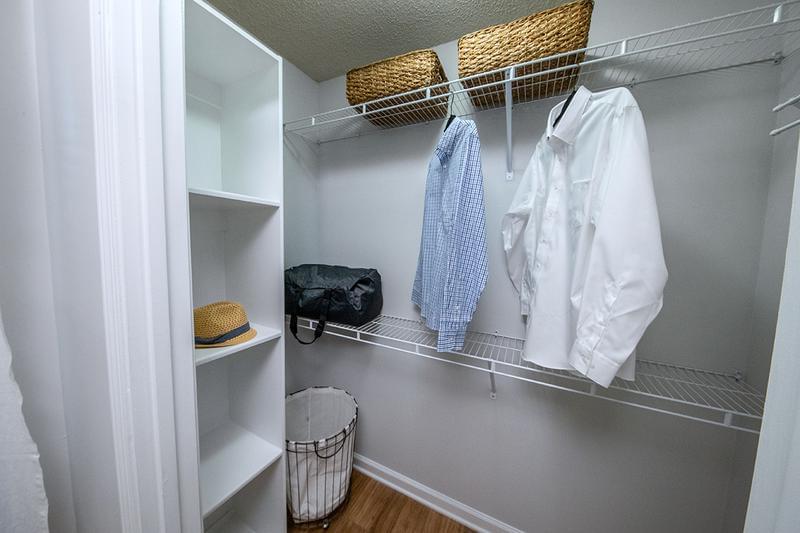 Walk-In Closets | Master bedrooms feature walk-in closets with built-in organizers.
