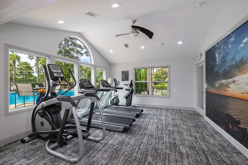 Cardio Equipment | Our fitness center features cardio equipment including treadmills, an elliptical, and bike.
