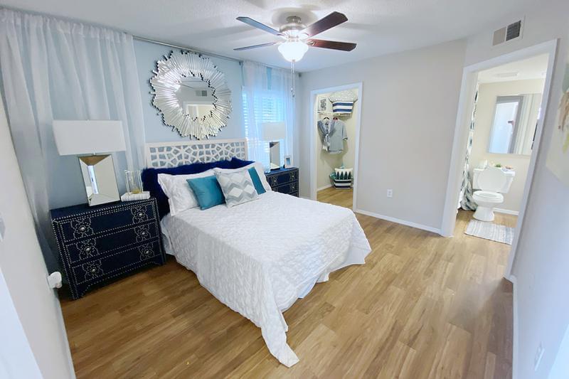 Master Bedroom | Spacious bedrooms with ceiling fan and a walk-in closet.