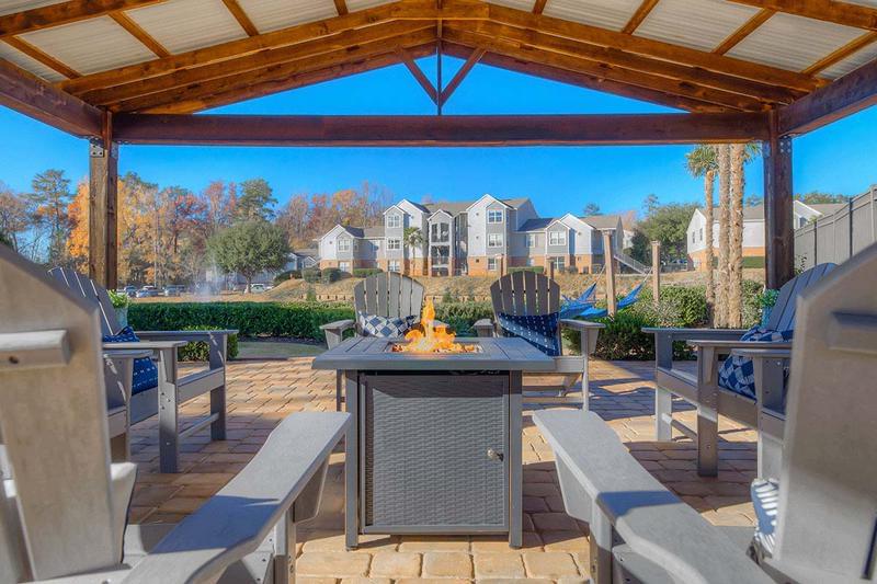 Pavilion | Relax outdoors by the fire pit under our large pavilion area.