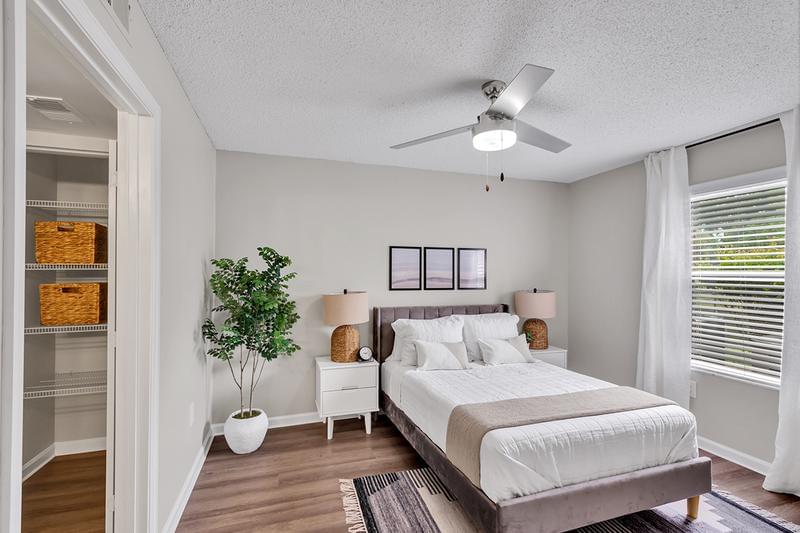 Master Bedroom | Spacious bedrooms with ceiling fan and a walk-in closet.