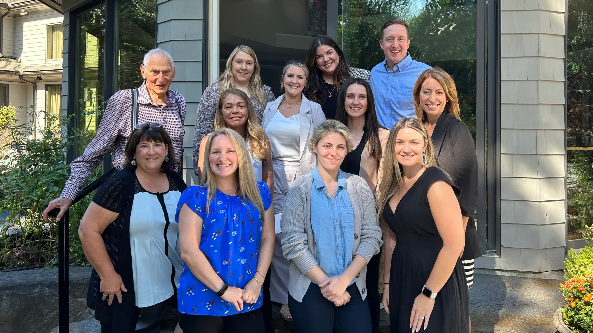 Our MA community managers gather for a photo with Harold Grinspoon, our founder.