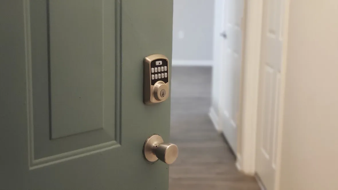 A front entry door with a secure punch pad for keyless entry to your apartment.  