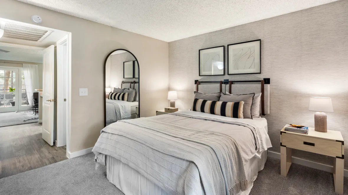 A spacious bedroom with soft carpeting and ample storage, perfect for creating your own dreamy bedroom oasis.
