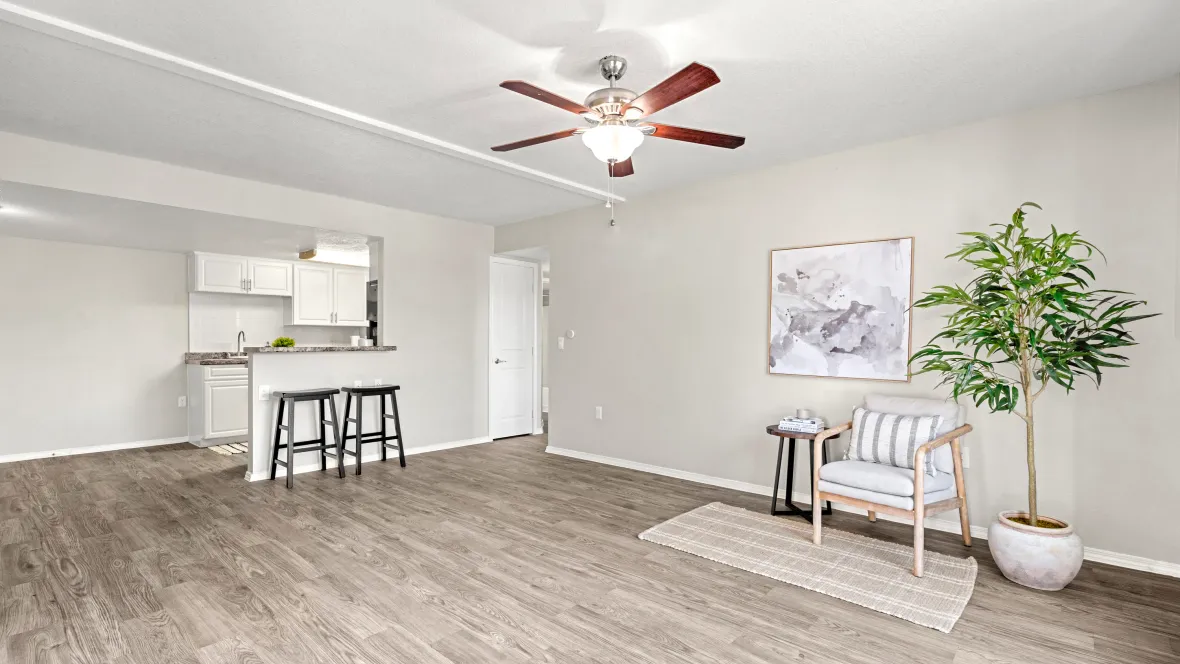 An expansive living space with a bonus ceiling fan and open kitchen concept. This is where comfort takes center stage.