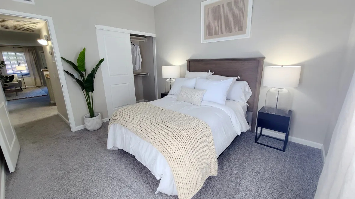 Cozy guest retreats with plush carpeting and generously sized closet space for maximum comfort and convenience.