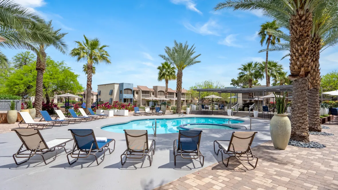 Sun-soaked moments on our roomy sundeck in a vibrant Mesa setting with abundant loungers easily accessible.