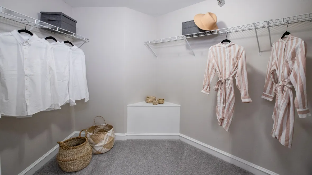 A magnificent walk-in wardrobe closet within the master bedroom ensuite, providing abundant storage options and curated wardrobe functionality, crafted for a life of royal organization and elegance.