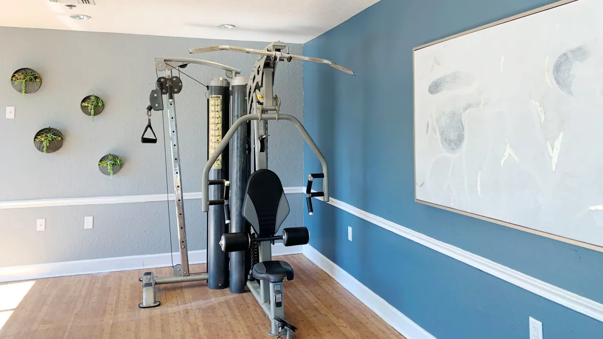 An all-in-one weight training machine inside of the community's fitness center.