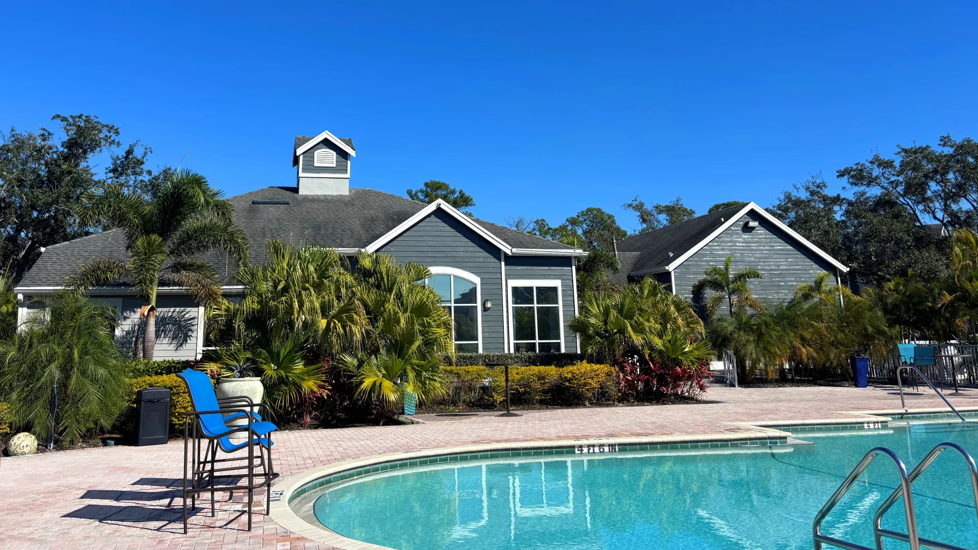 Soak up the Florida sunshine beside our sparkling resort-style pool, framed by lush palm trees and our newly painted clubhouse at Eden Pointe in Bradenton.