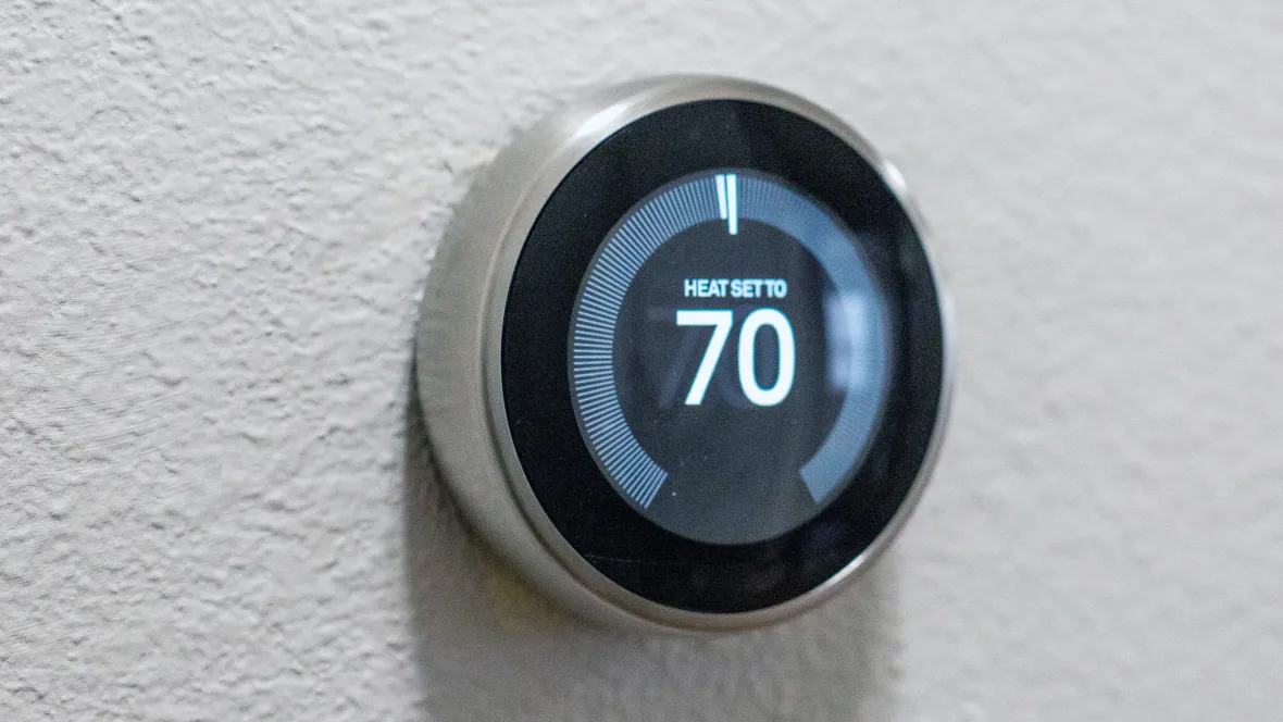 Smart thermostat control panel with sleek, user-friendly interface.