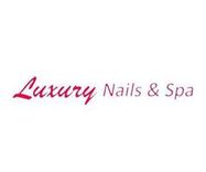 the logo for Luxury Nails and Spa