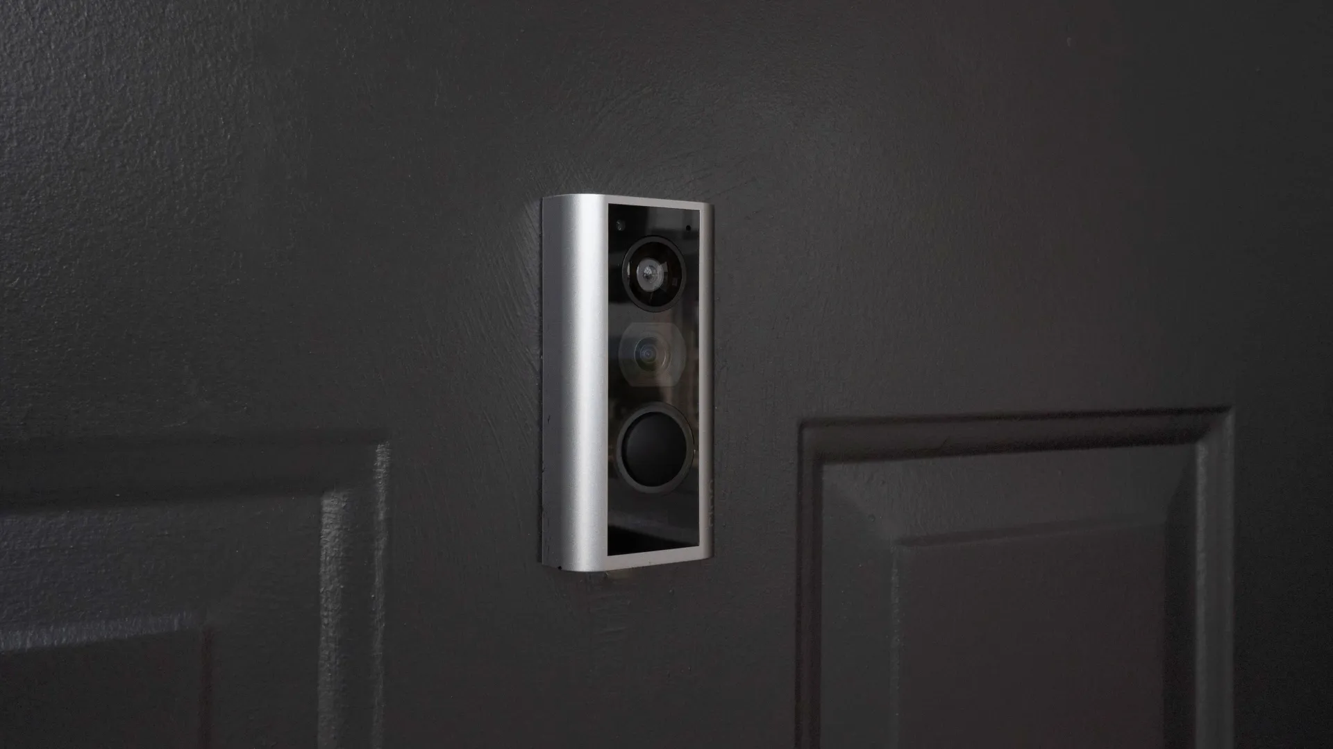 Smart video doorbell at Ridgemar Commons featuring a built-in camera, doorbell button, and modern apartment smart-home technology.