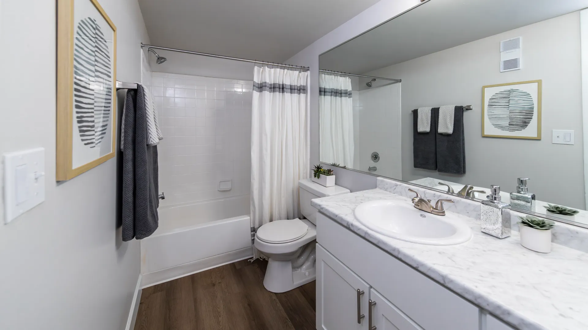 Enjoy expansive mirrors and sprawling counter space in your ideal bathroom. 