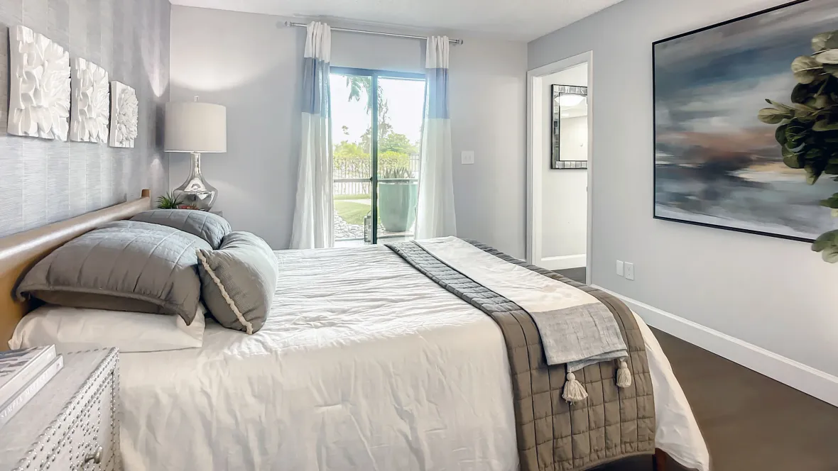 An exclusive passage from the bedroom to a peaceful patio, fusing luxurious indoor living with an outdoor haven – a distinctive feature of the Riviera layout.