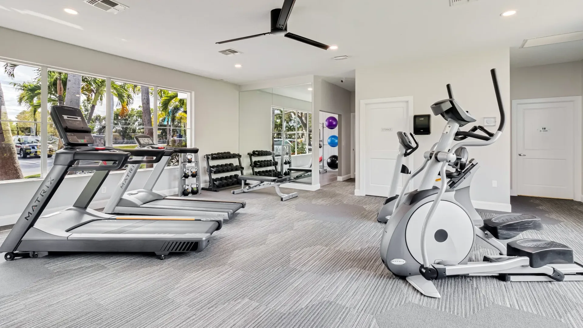 A community fitness center with cardio and yoga equipment