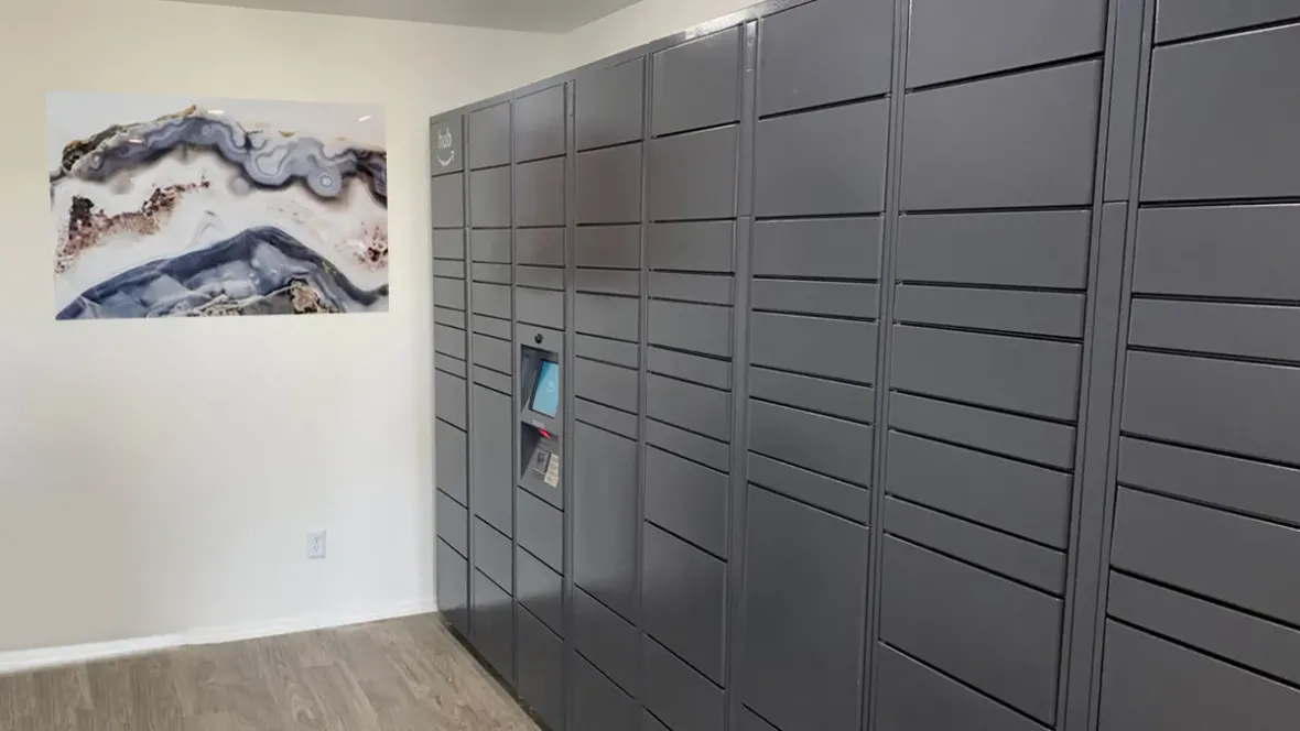 An Amazon Hub Locker, a secure and convenient package delivery system for residents, providing a seamless experience for package pickups and drop-offs.