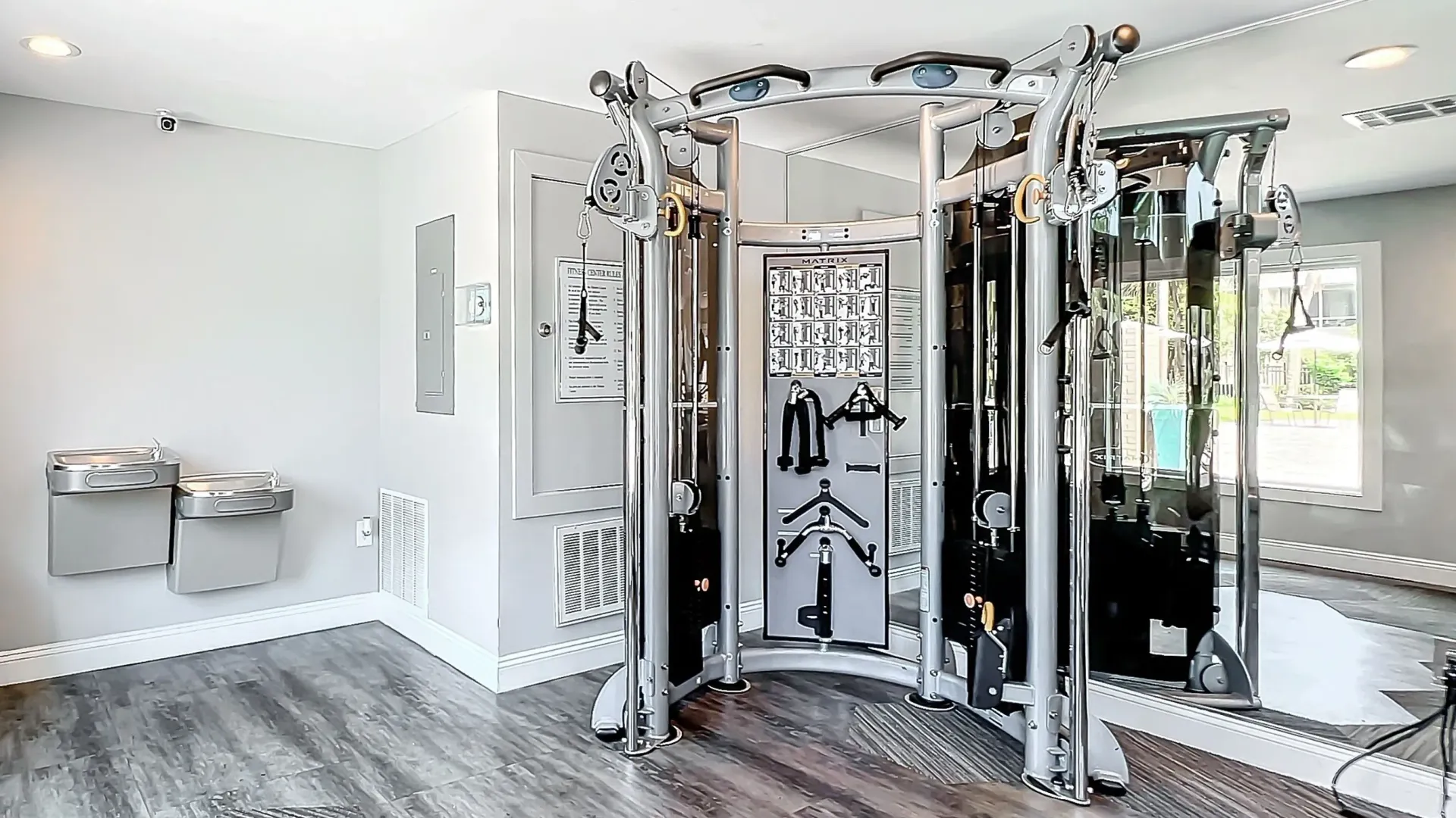 Advanced strength training equipment with multiple attachments in the fitness center.