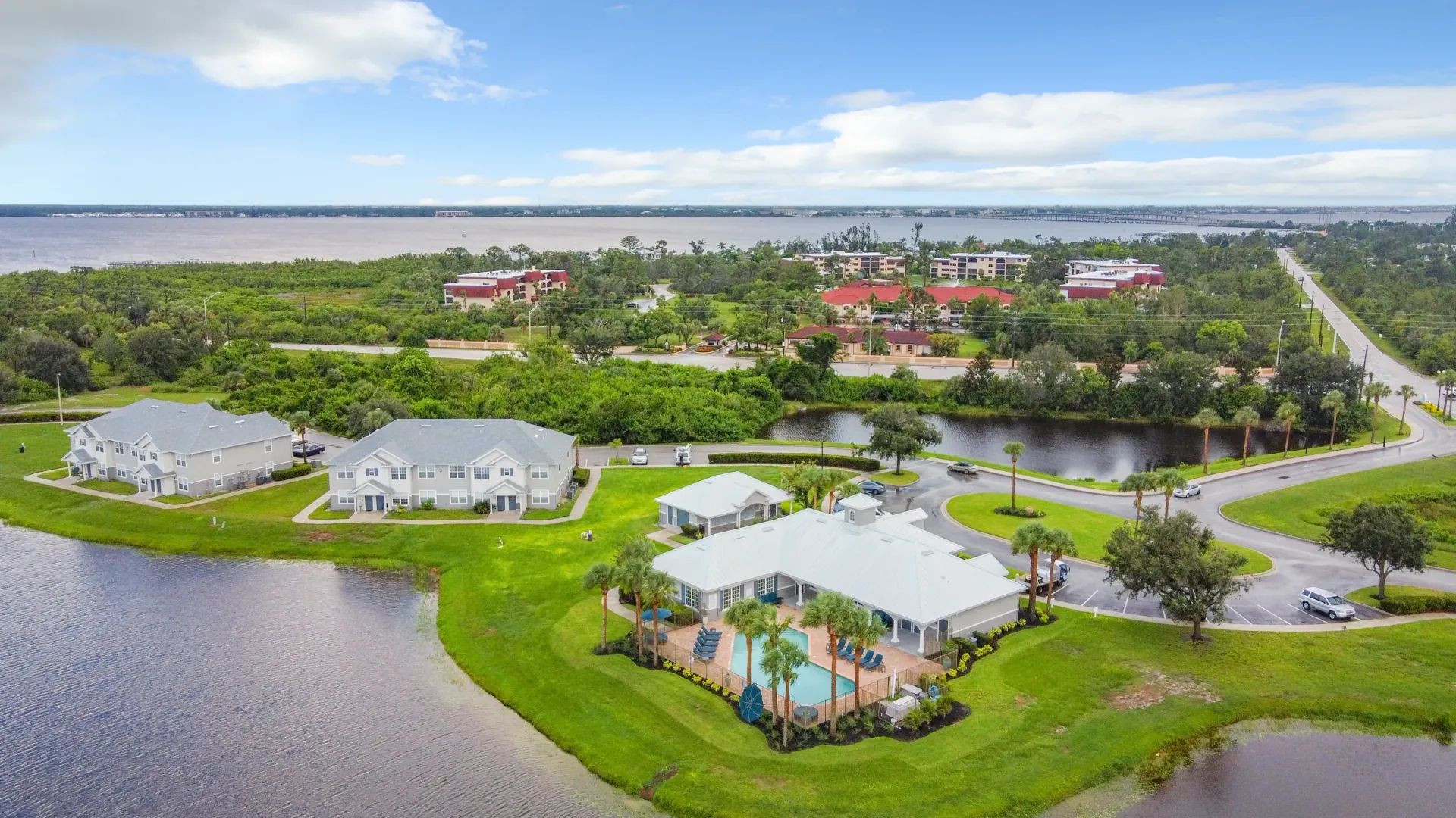 An aerial snapshot of Charleston Cay, revealing the picturesque blend of greenery, glistening waters, and its close proximity to Peace River. 