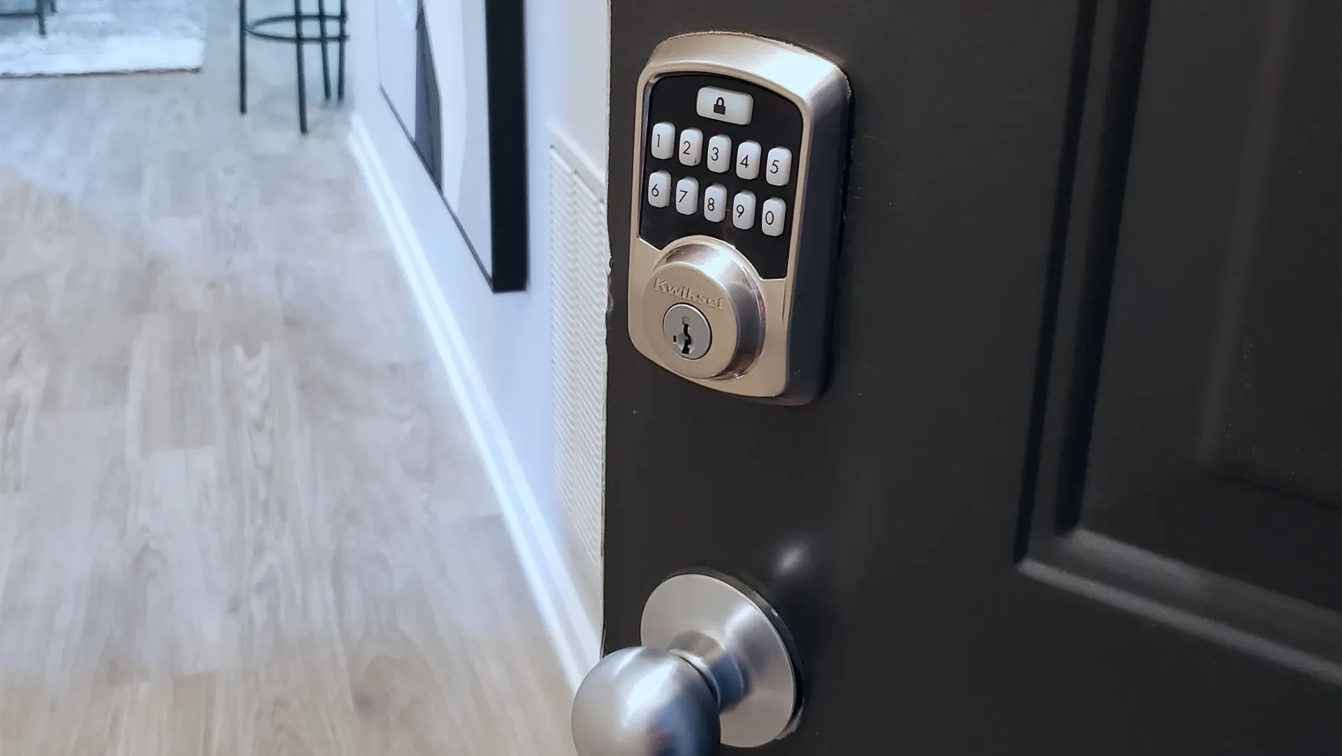 A smart lock with a keypad on an apartment door
