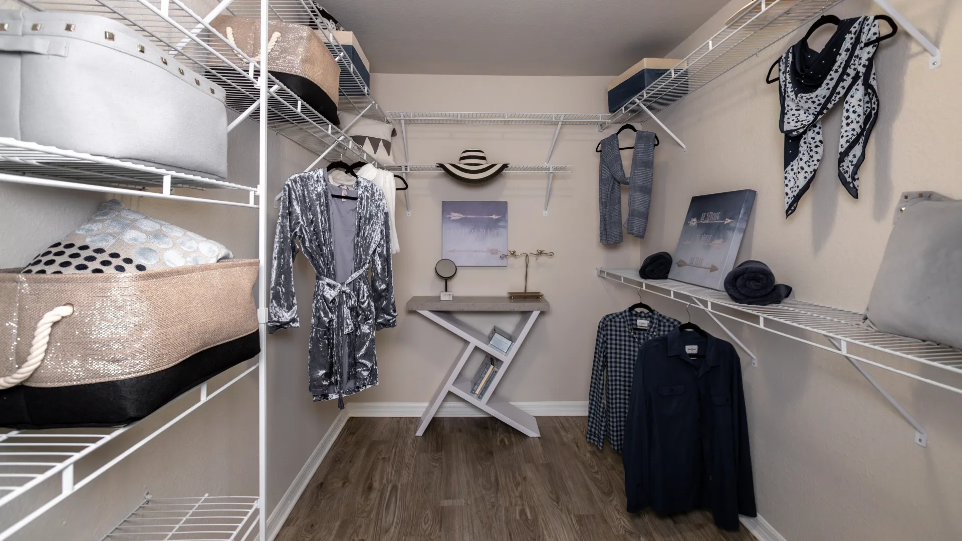 A ginormous closet adorned, large enough to add a twin bed, with wall-to-wall open wire shelving—a haven for storage exuding luxury.